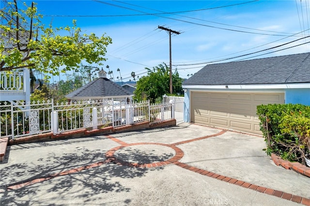 detached garage with fence