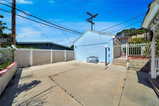 view of patio / terrace with fence