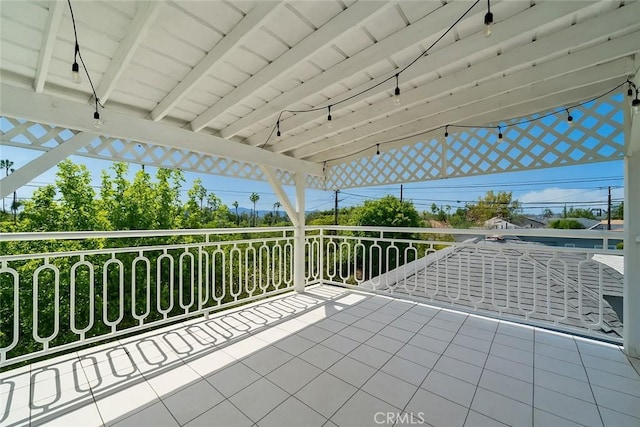 view of patio / terrace with a balcony