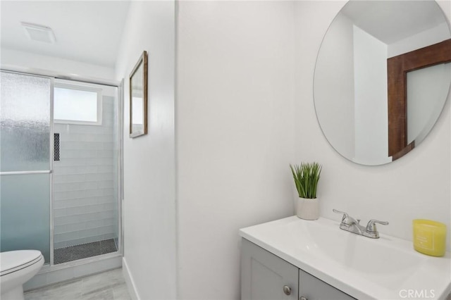 845 W Gateway Dr, Palm Springs, CA 92262 - full bathroom featuring toilet, vanity, and a stall shower