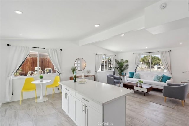 845 W Gateway Dr, Palm Springs, CA 92262 - kitchen with recessed lighting, a kitchen island, white cabinets, light countertops, and open floor plan