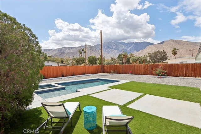 845 W Gateway Dr, Palm Springs, CA 92262 - view of yard with a mountain view, a patio, and a pool with connected hot tub