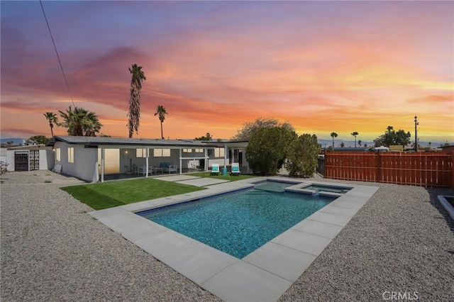 845 W Gateway Dr, Palm Springs, CA 92262 - view of swimming pool with a patio, a fenced backyard, and a pool with connected hot tub