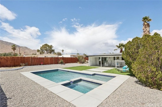 845 W Gateway Dr, Palm Springs, CA 92262 - view of swimming pool featuring a fenced backyard, a patio, and a pool with connected hot tub