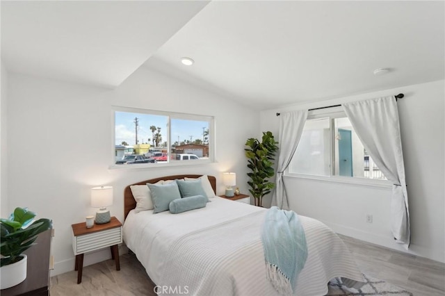 845 W Gateway Dr, Palm Springs, CA 92262 - bedroom featuring vaulted ceiling, multiple windows, and baseboards