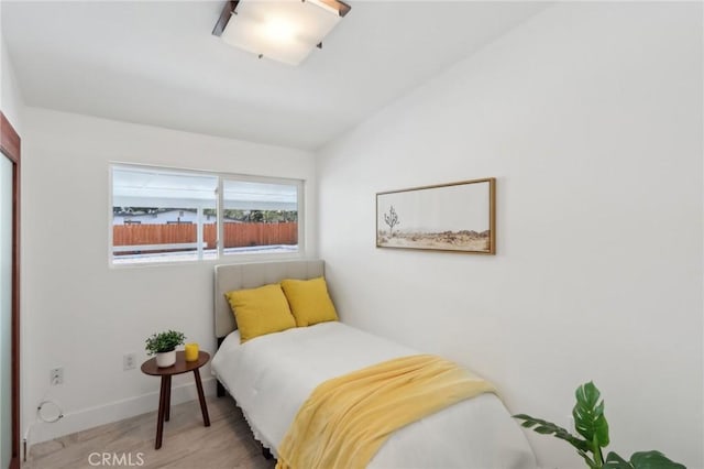845 W Gateway Dr, Palm Springs, CA 92262 - bedroom featuring light wood-style floors and baseboards