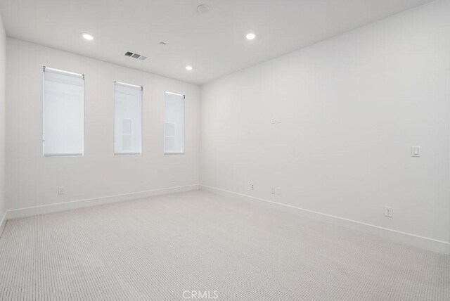120 Zawn, Irvine, CA 92618 - empty room with recessed lighting, visible vents, baseboards, and light colored carpet