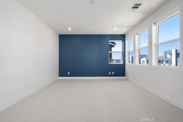 120 Zawn, Irvine, CA 92618 - empty room featuring visible vents, baseboards, and carpet flooring