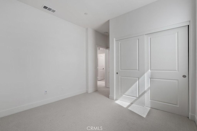 120 Zawn, Irvine, CA 92618 - unfurnished bedroom with light carpet, visible vents, a closet, and baseboards