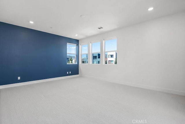 120 Zawn, Irvine, CA 92618 - carpeted spare room featuring recessed lighting, visible vents, and baseboards