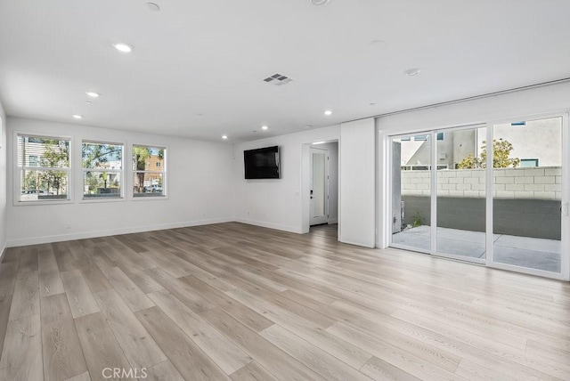 120 Zawn, Irvine, CA 92618 - unfurnished living room featuring light wood finished floors, baseboards, visible vents, and recessed lighting
