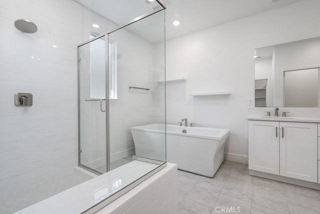 120 Zawn, Irvine, CA 92618 - full bathroom with baseboards, a freestanding bath, a stall shower, and vanity