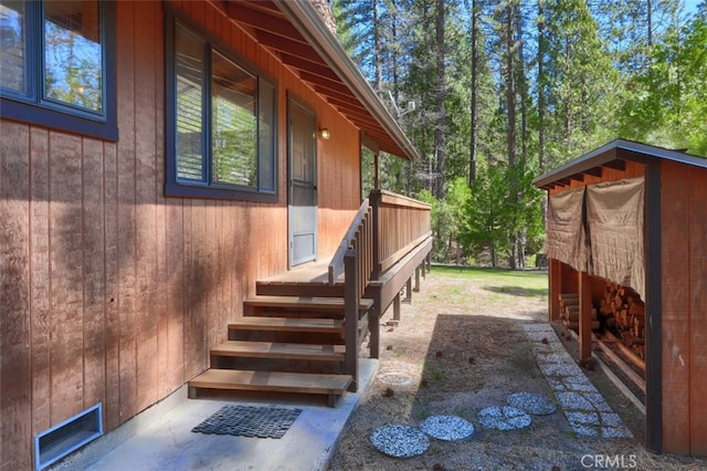 entrance to property featuring visible vents