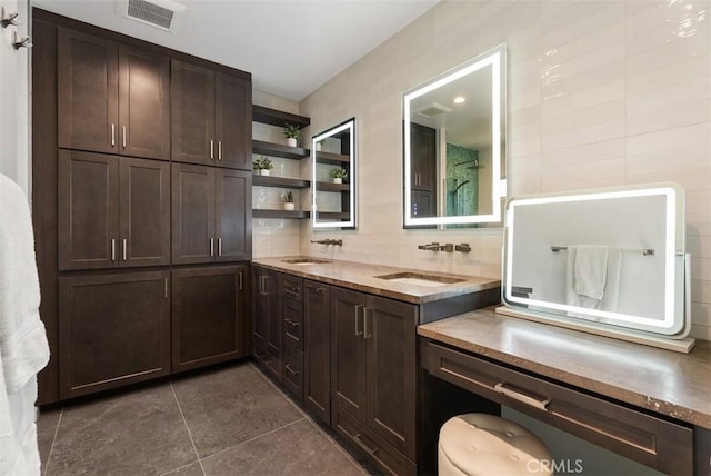 3556 Rutgers Ave, Long Beach, CA 90808 - full bathroom featuring tile patterned floors, backsplash, and double vanity