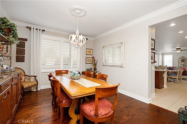 37557 Windsor Ct, Murrieta, CA 92562 - dining space featuring crown molding, baseboards, recessed lighting, ceiling fan with notable chandelier, and hardwood / wood-style floors