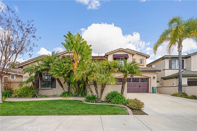 37557 Windsor Ct, Murrieta, CA 92562 - view of front of home with stucco siding, a garage, and concrete driveway