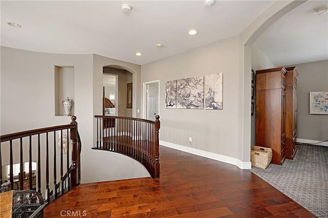 37557 Windsor Ct, Murrieta, CA 92562 - hall with an upstairs landing, hardwood / wood-style flooring, baseboards, arched walkways, and recessed lighting