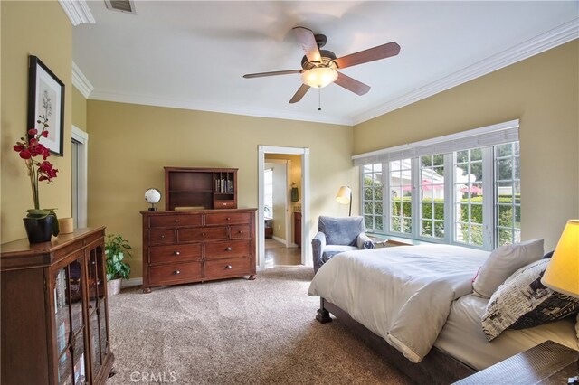 41548 Hutchison Ct, Murrieta, CA 92562 - carpeted bedroom featuring crown molding, baseboards, ceiling fan, and ensuite bath