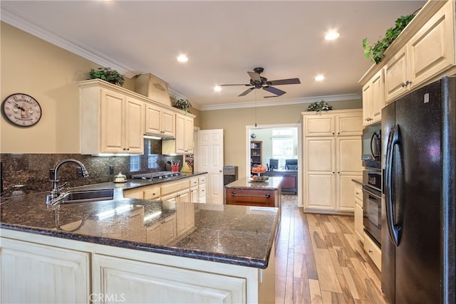 41548 Hutchison Ct, Murrieta, CA 92562 - kitchen featuring black appliances, a sink, ornamental molding, a ceiling fan, and a peninsula