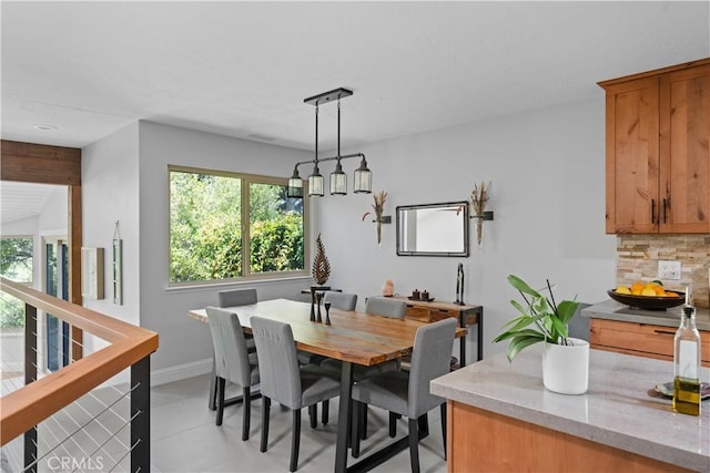 dining space with baseboards
