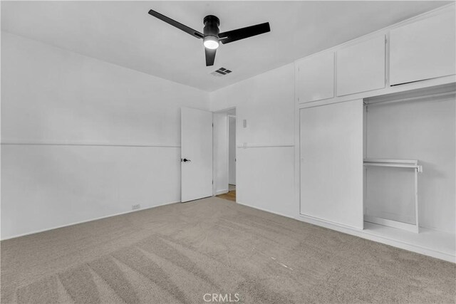 44546 E 3rd St E, Lancaster, CA 93535 - unfurnished bedroom featuring carpet flooring, a closet, and ceiling fan