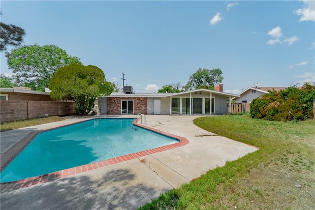 44546 E 3rd St E, Lancaster, CA 93535 - view of swimming pool featuring a patio