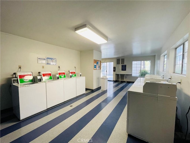 interior space with washer and clothes dryer