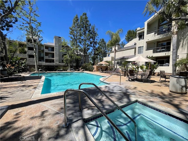 pool featuring a patio