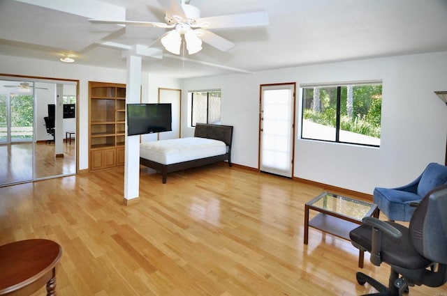 bedroom with baseboards and light wood-style floors