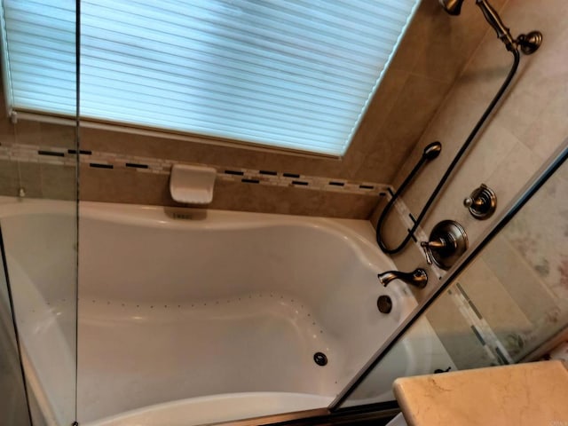 full bath featuring a bath