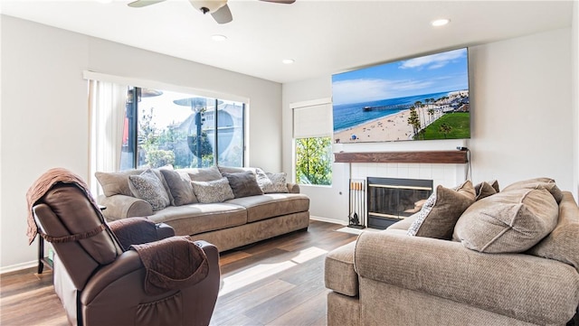 2773 W Summerset Dr, Rialto, CA 92377 - living room featuring wood finished floors, a ceiling fan, recessed lighting, a tile fireplace, and baseboards