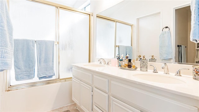 2773 W Summerset Dr, Rialto, CA 92377 - full bath with double vanity and enclosed tub / shower combo