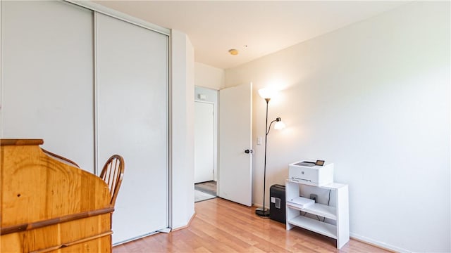 2773 W Summerset Dr, Rialto, CA 92377 - bedroom with light wood finished floors and a closet