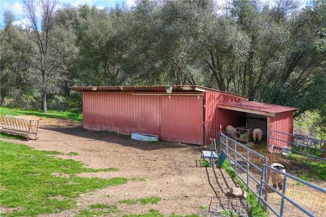 view of outbuilding featuring an exterior structure and an outbuilding