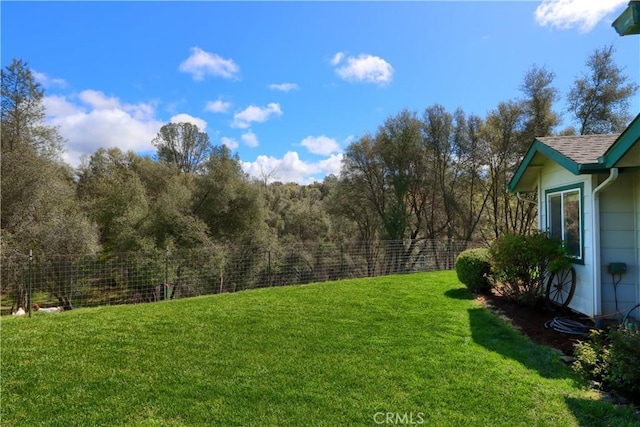 view of yard with fence