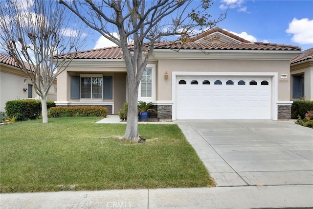 view of front of home featuring stone siding, driveway, a tile roof, and stucco siding