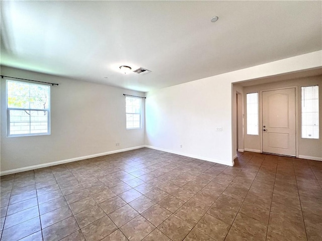 2866 S Via Belamaria, Ontario, CA 91762 - tiled spare room with baseboards and visible vents