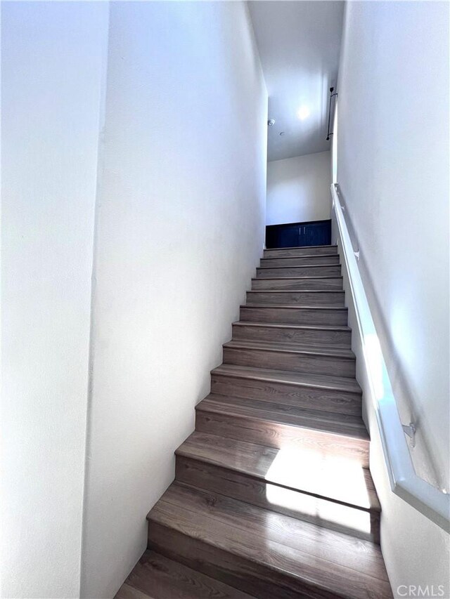 2866 S Via Belamaria, Ontario, CA 91762 - staircase with wood finished floors
