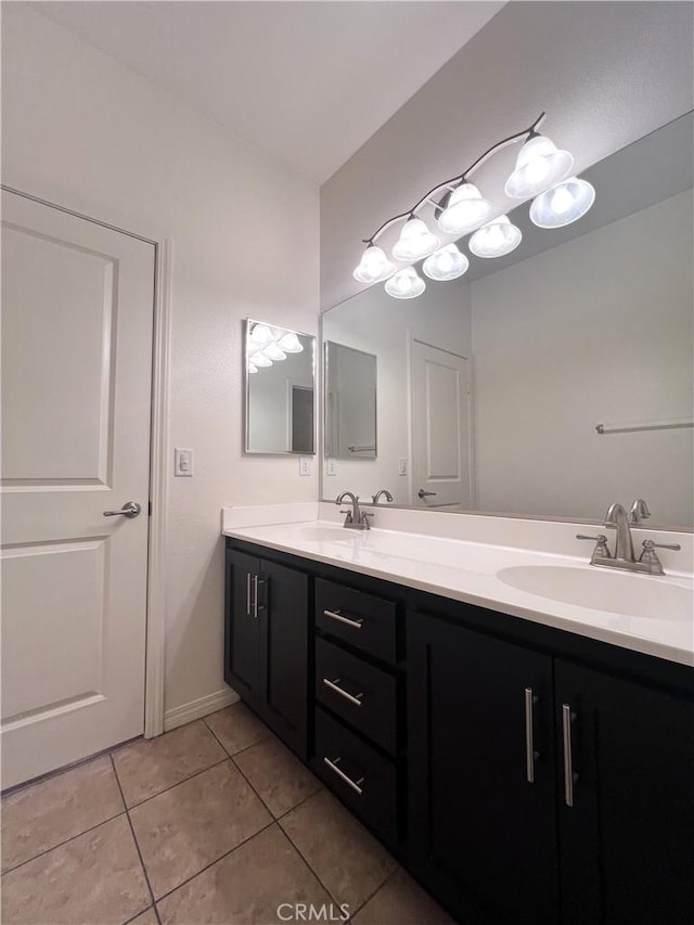 2866 S Via Belamaria, Ontario, CA 91762 - bathroom featuring double vanity, tile patterned floors, and a sink