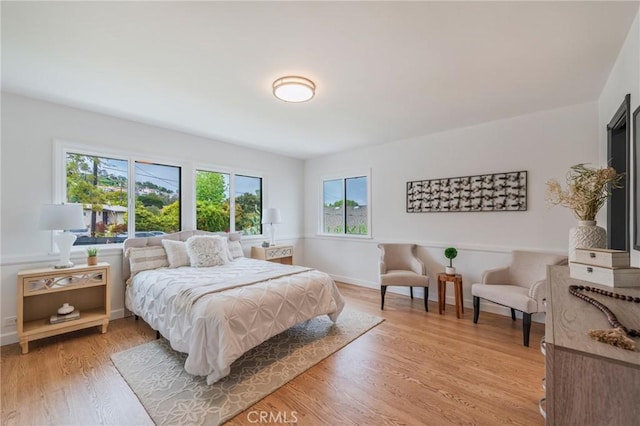 24422 Los Codona Ave, Torrance, CA 90505 - bedroom with light wood-type flooring and baseboards