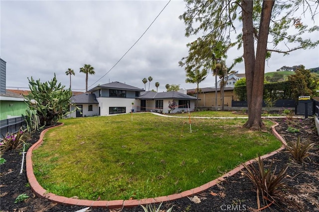 view of yard featuring fence