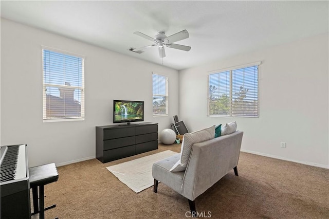 32177 Clear Springs Dr, Winchester, CA 92596 - carpeted living area with ceiling fan and baseboards