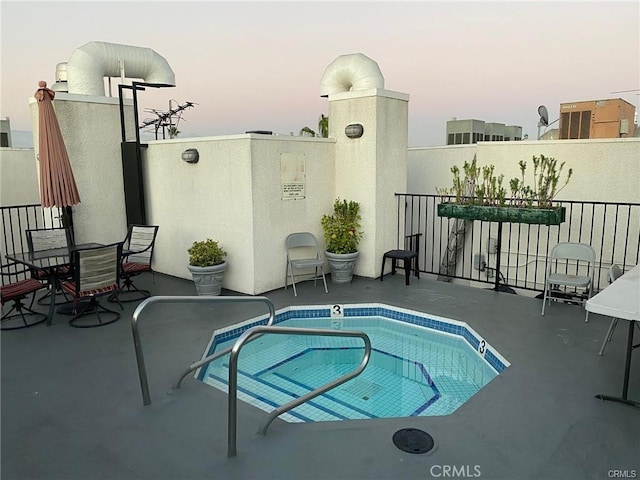 view of swimming pool featuring a patio