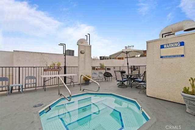 view of pool with a patio area