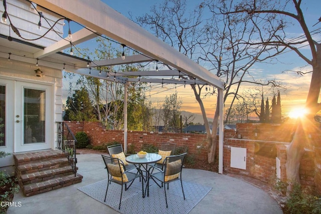 3447 Burritt Way, La Crescenta, CA 91214 - patio terrace at dusk with a patio area, a pergola, and outdoor dining space