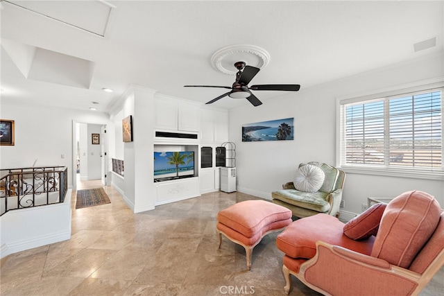 living room with visible vents, baseboards, a ceiling fan, and recessed lighting