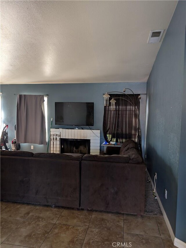 624 Kesha Ct, San Jacinto, CA 92583 - living room with a fireplace and baseboards