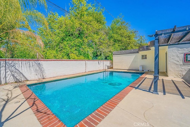 view of swimming pool with a patio, a fenced backyard, and a fenced in pool