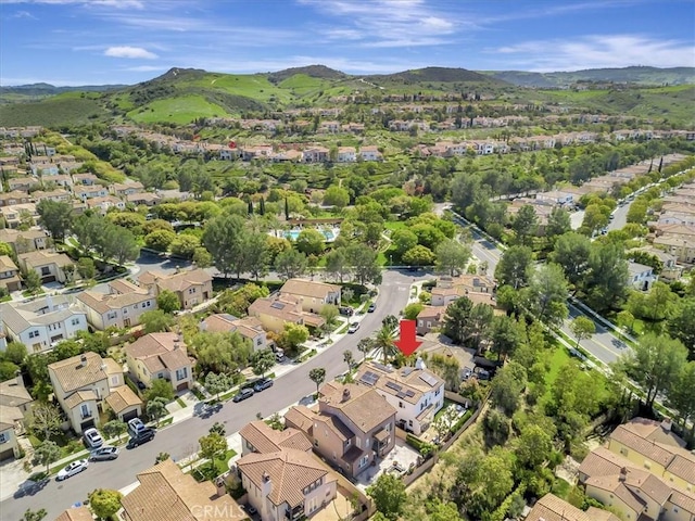 bird's eye view with a residential view and a mountain view