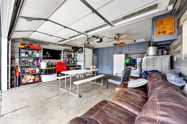 garage featuring freestanding refrigerator